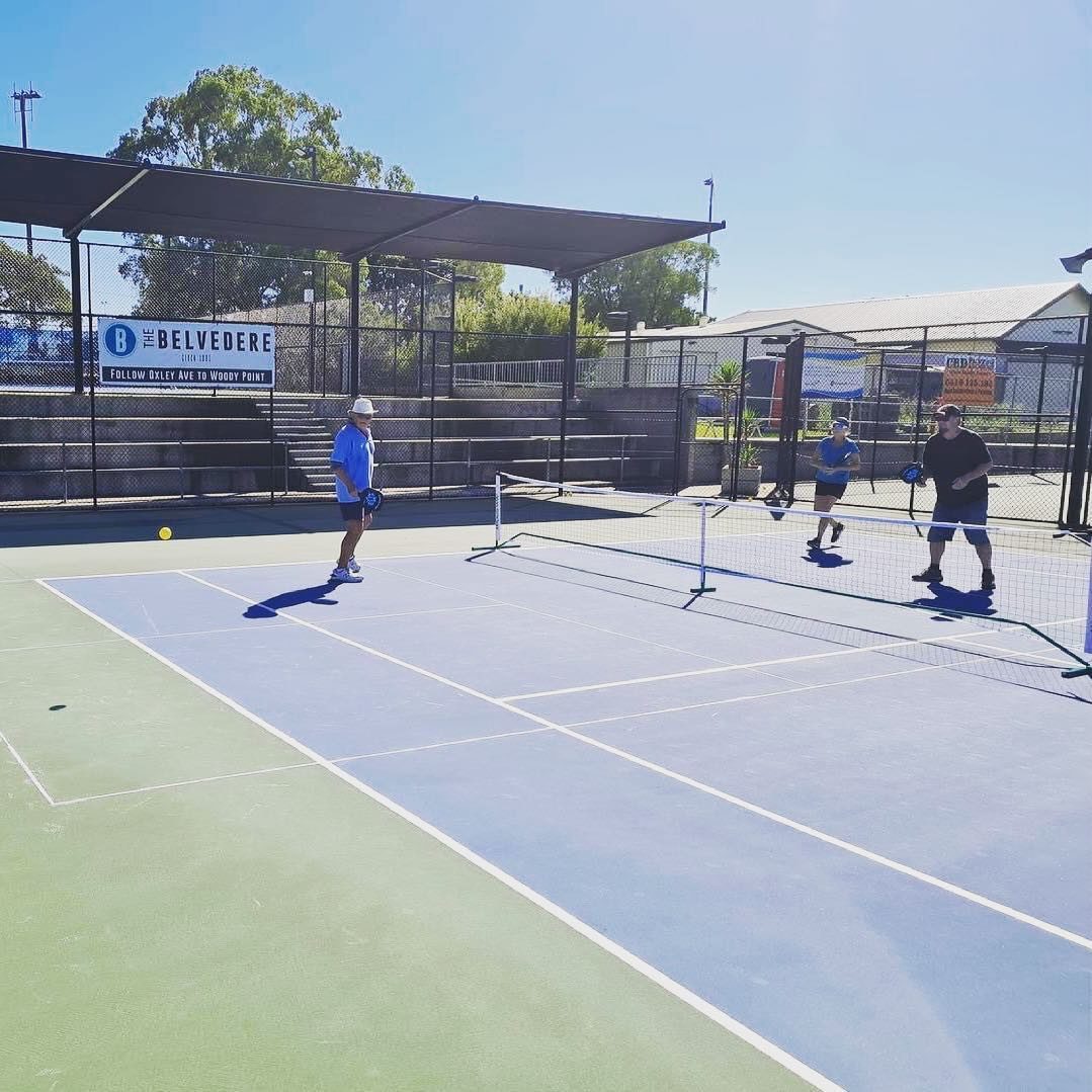 Pickleball players at Redcliffe Tennis Centre playing on court
